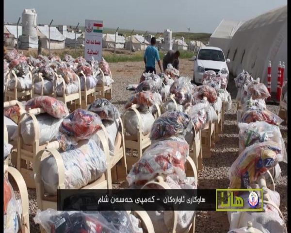 هاوكاری ئاواره‌كانی كه‌مپی حسن شام مساعدات منظمة هانا للاغاثة لنازحى مدينة موصل